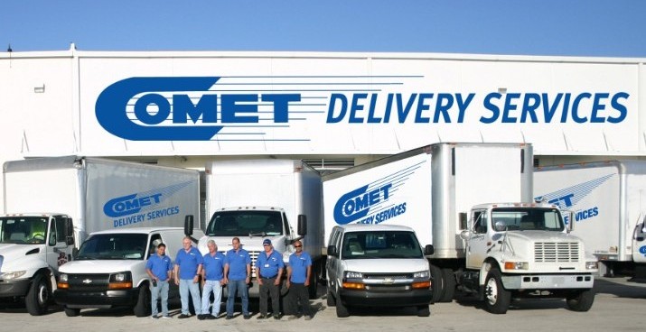 Comet Delivery employees and trucks