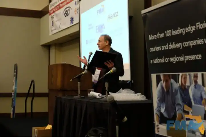 Steven Seltzer giving his Florida Messenger Association Hall of Fame induction speech